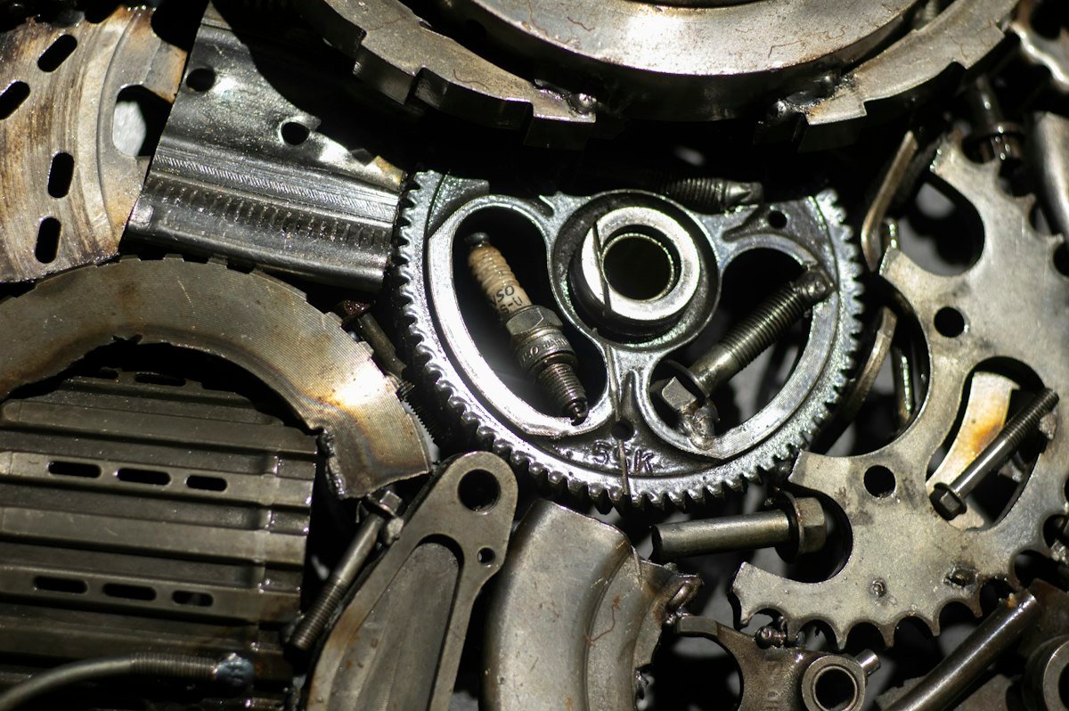 Close-up of interlocking steel gears and machine components.